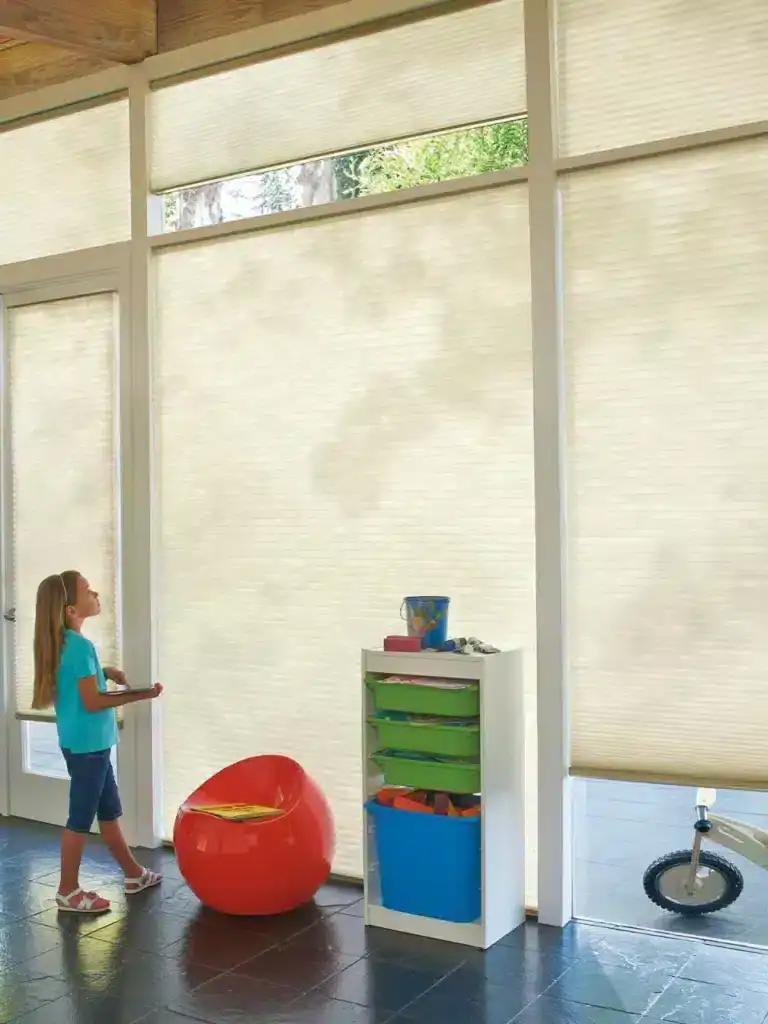 Darkening beige roller shades for energy efficiency and UV protection, perfect for home, office, or commercial spaces.