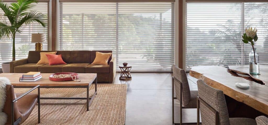 Luxury window blinds and drapery for modern living room ceiling-to-floor horizontal wooden blinds with natural light filtering, stylish home interior, energy-efficient window treatment solutions.