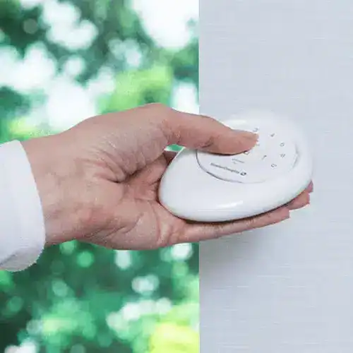 Wireless window blind remote control for easy shade adjustment at Blinds West.