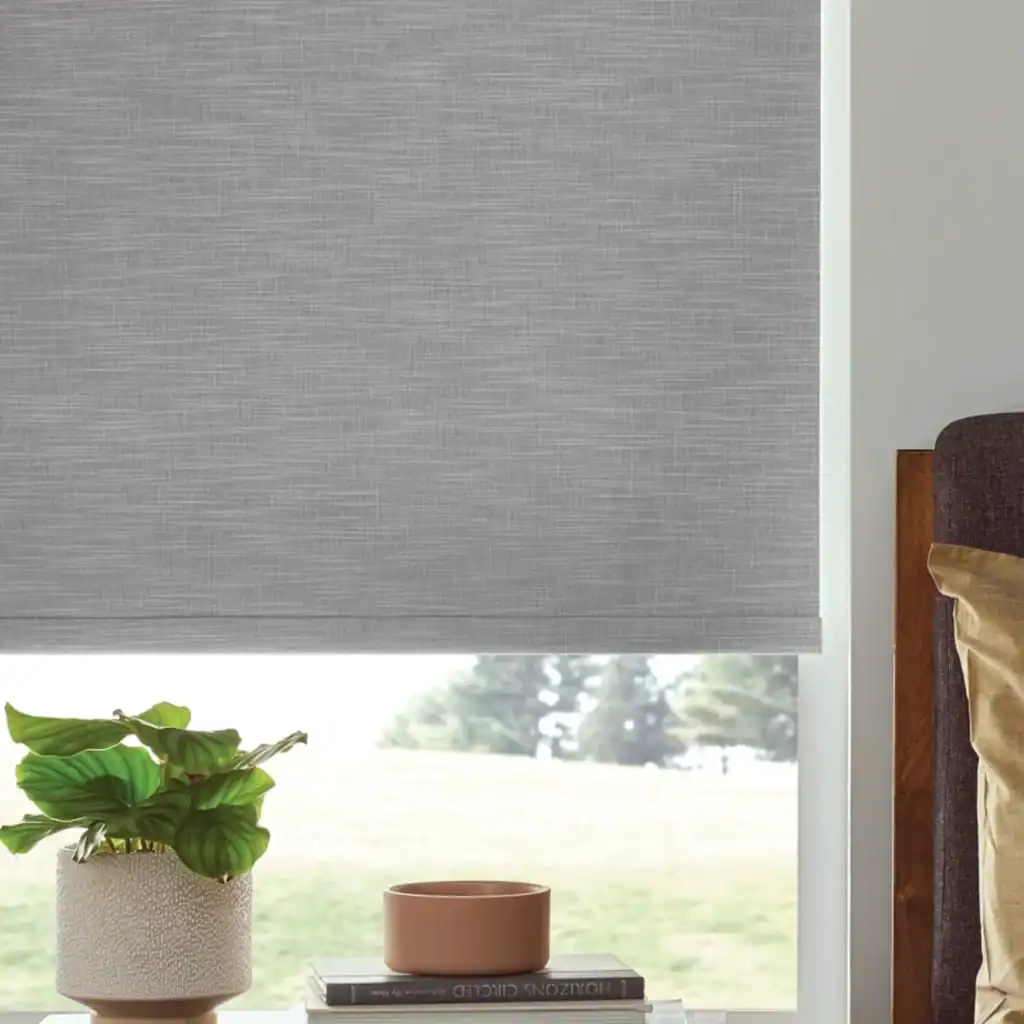 Soft gray textured window shades for modern home decor, blocking sunlight while adding style, available from Blinds West.