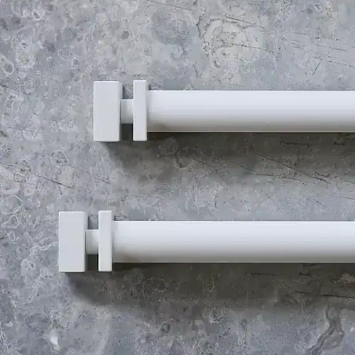 Elegant white curtain rods with modern design, ideal for enhancing window treatments in homes and offices. Perfect for decorative drapery and custom curtain installation.