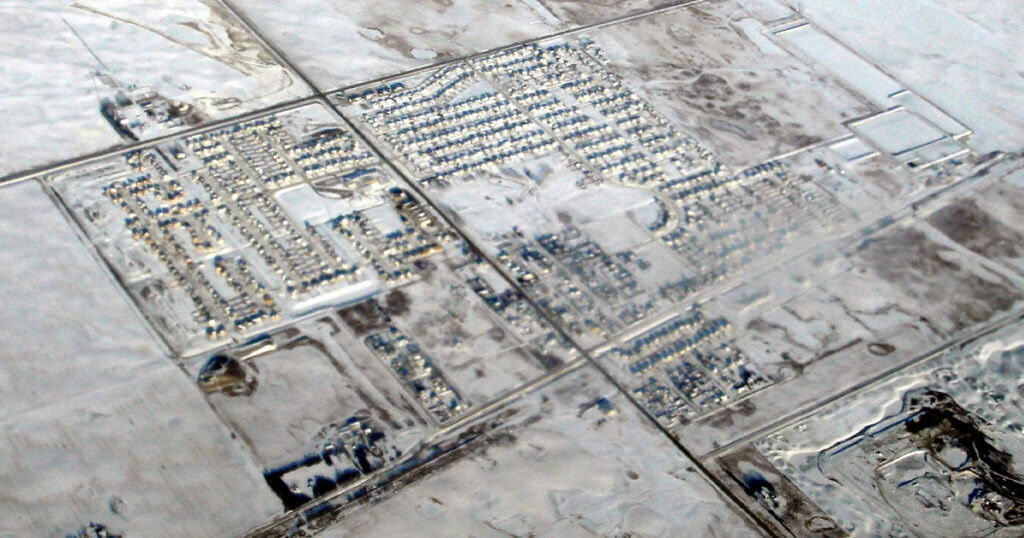 High-tech circuit boards embedded in ice, showcasing advanced electronic components and wiring in a frozen environment.